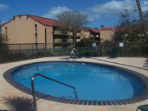 One of 3 swimming pools on property, one per building
