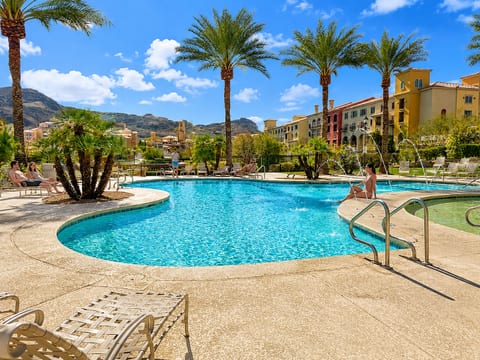 Relax at the resort-style pool and hot tub with mountain views.