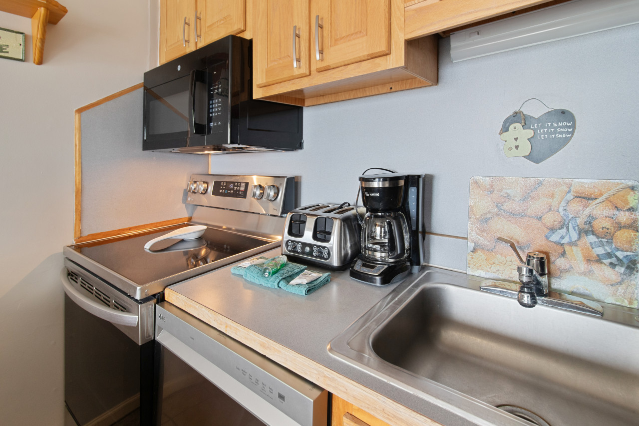 Kitchen area with drip coffee pot