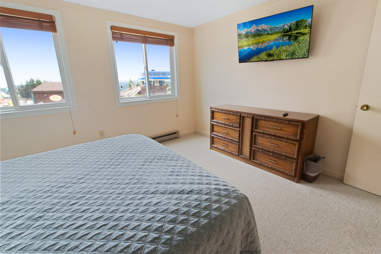 TV in main bedroom and view of chairlift