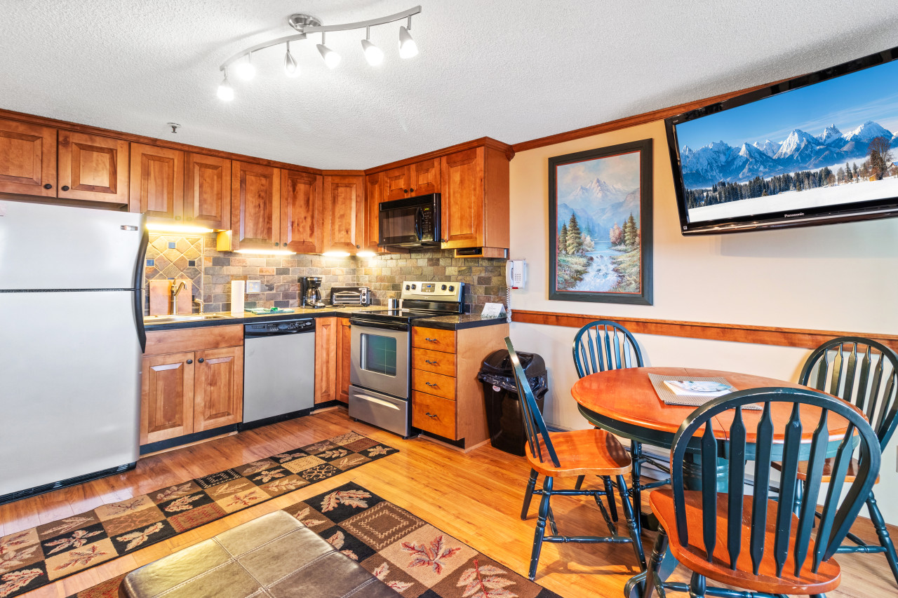 Remodeled kitchen is fully-equipped with pots, pans & utensils.