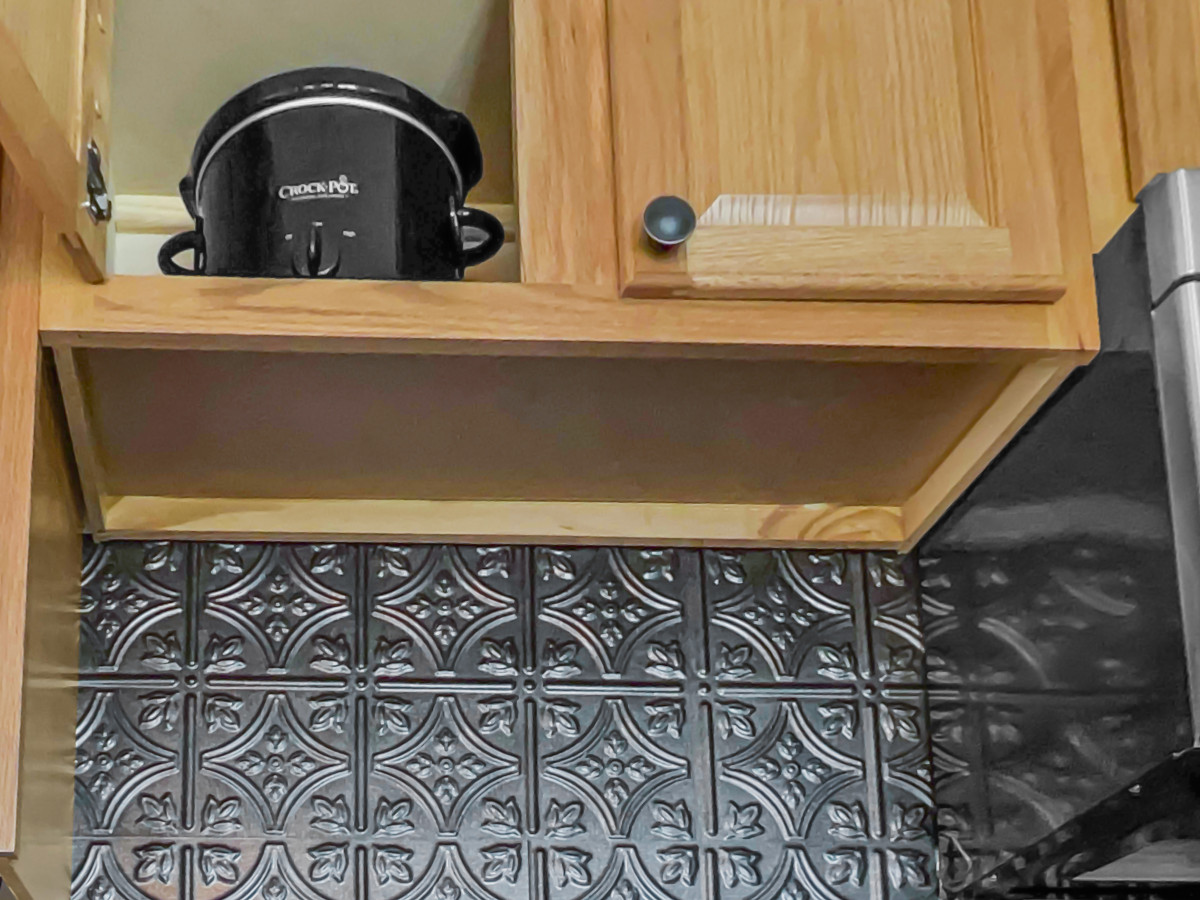 Remodeled kitchen is fully-equipped with pots, pans & utensils