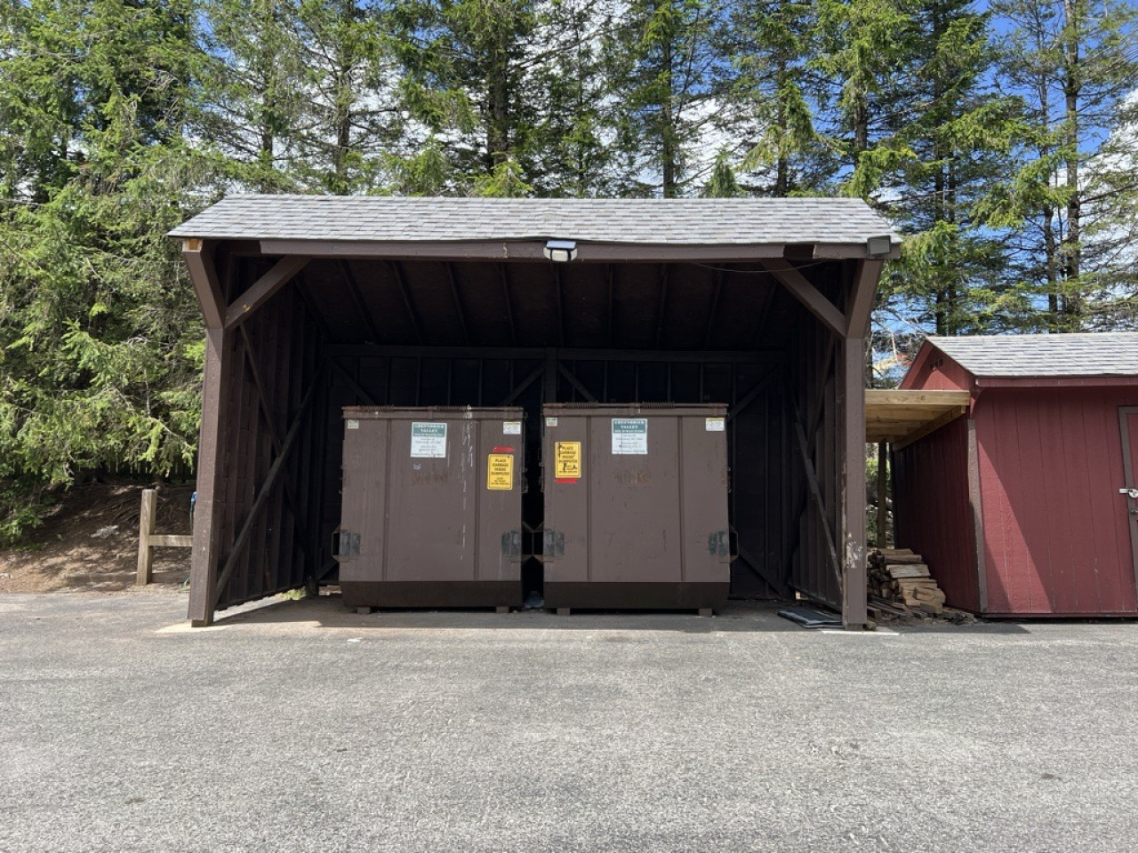 Waste disposal located in the parking lot.