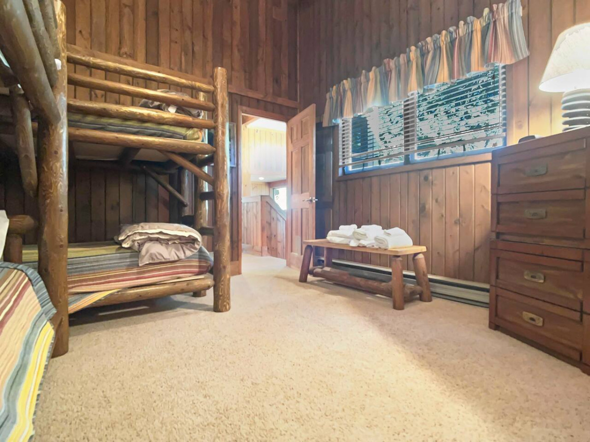 Four twin beds in bunk room