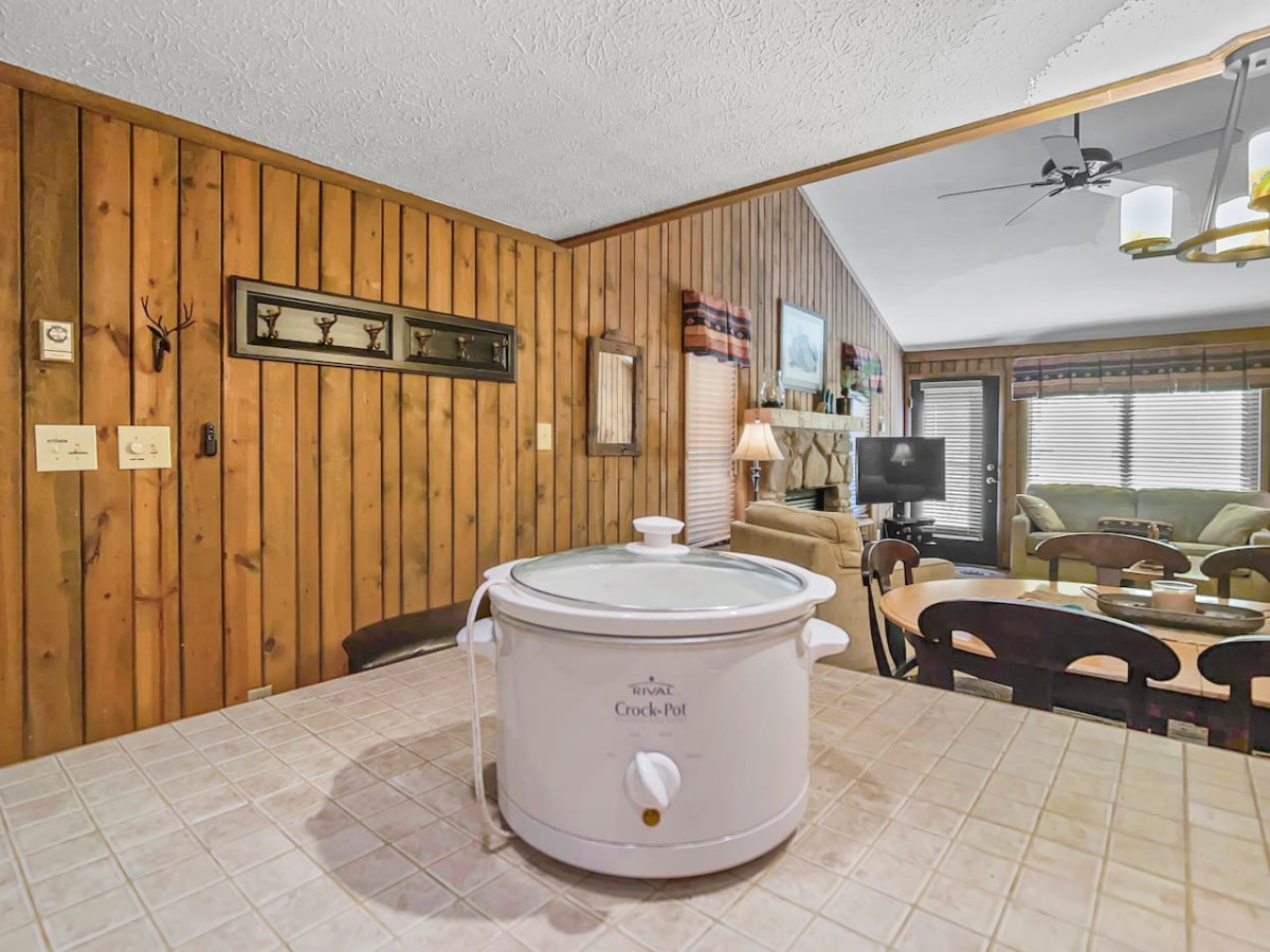 There is a crock pot in the kitchen