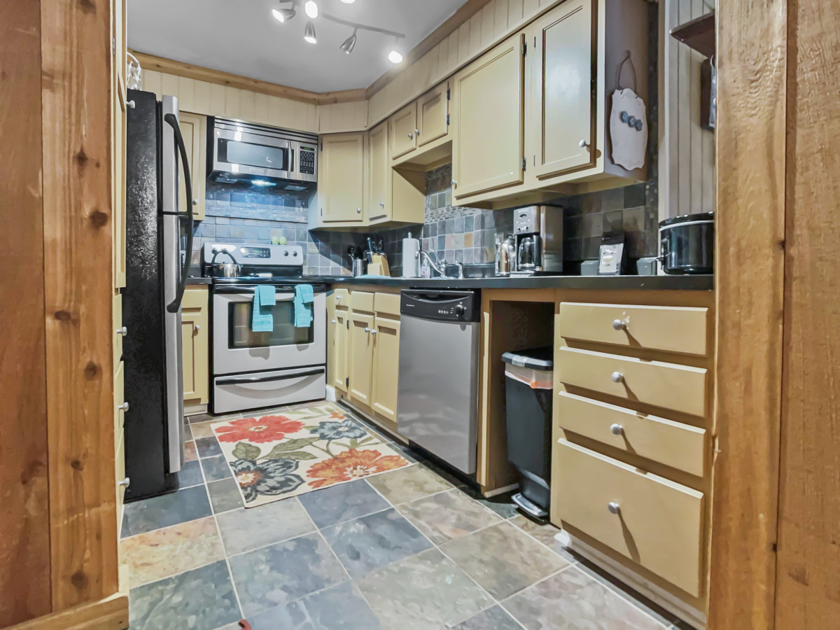 Full kitchen with stainless steel appliances