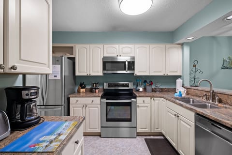 Our fully equipped kitchen has everything you need to make a meal, or enjoy a coffee while viewing the lagoon and wildlife from our deck!