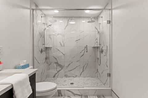 Grayscale tiles create a crisp, modern foundation.