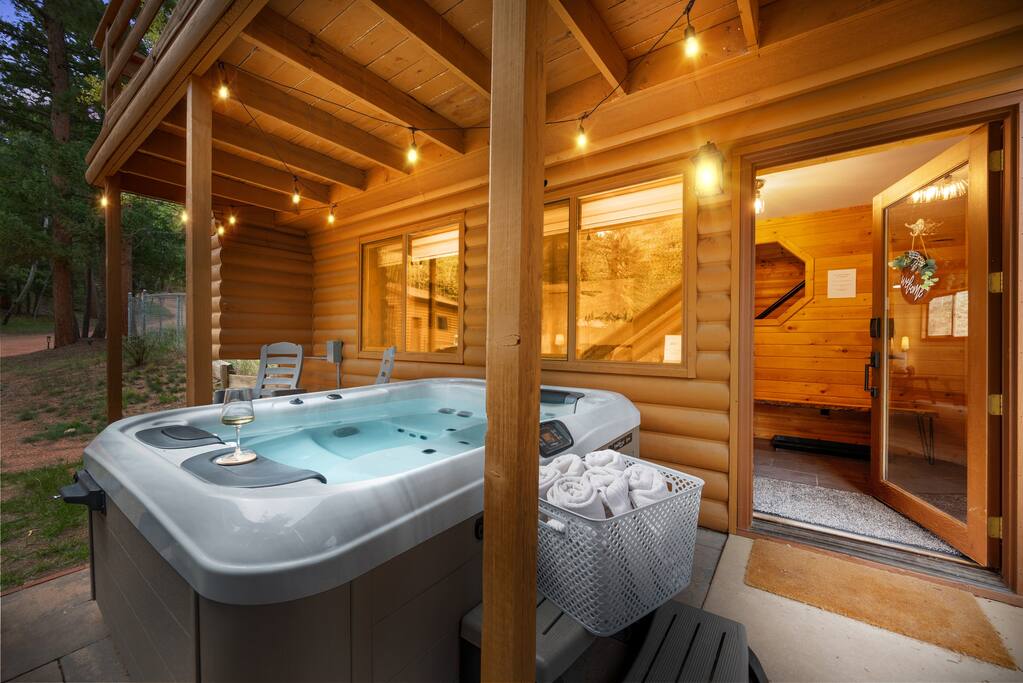 Unwind in the twilight hot tub on the patio, easily accessible from the main floor. Soak in the soothing waters while enjoying the provided spa towels. Nearby, patio rockers and a table invite you to relax under the stars.