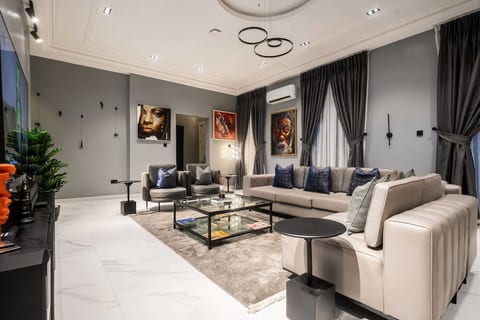 Relax and unwind in our stylish living room, where comfort meets modern elegance
