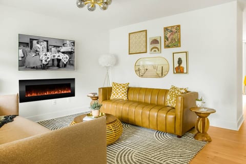 Electric fireplace for ambience only. The home is kept warm through central heating, so you can enjoy the cozy glow without relying on it for heat.
