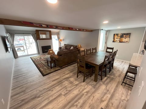 Open-concept living, dining, and kitchen area — designed for gathering, relaxing, and entertaining larger groups.