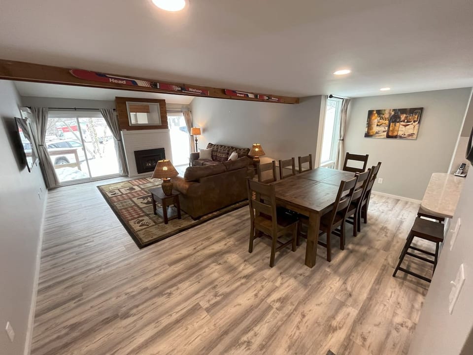 Open-concept living, dining, and kitchen area — designed for gathering, relaxing, and entertaining larger groups.