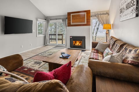 Cozy Great Room with Propane Fireplace — The perfect place to relax after a full day skiing Jay Peak’s legendary powder.