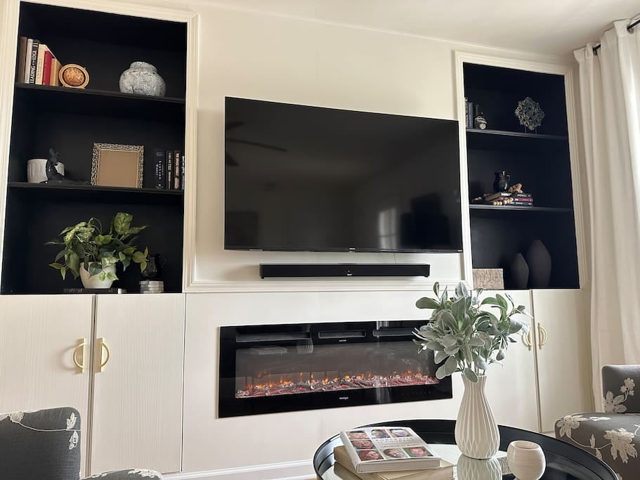 Entertainment center with heat generating digital fireplace
