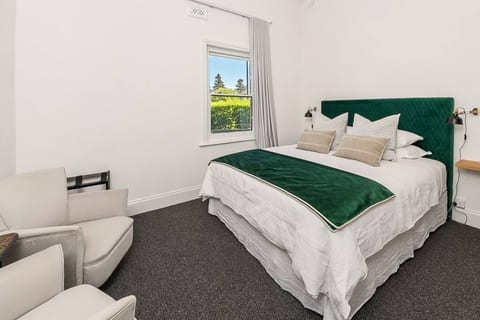 Bedroom 1 - king-sized bed and views to the square
