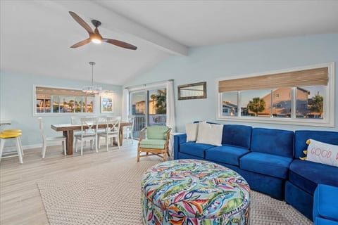 A beautiful open concept living room, dining room and kitchen welcome you upon entering the home through the large sliding glass doors.