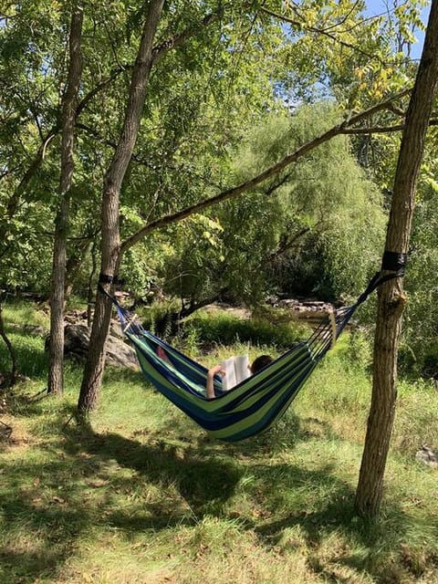Relax in the hammock, read a book and listen to nature
