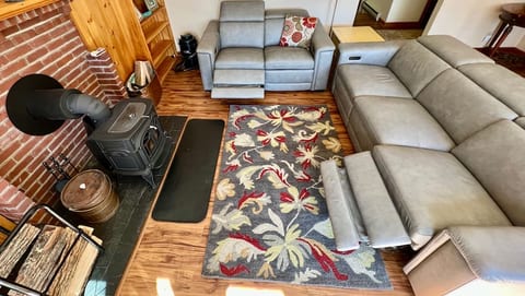 Living room has wood stove