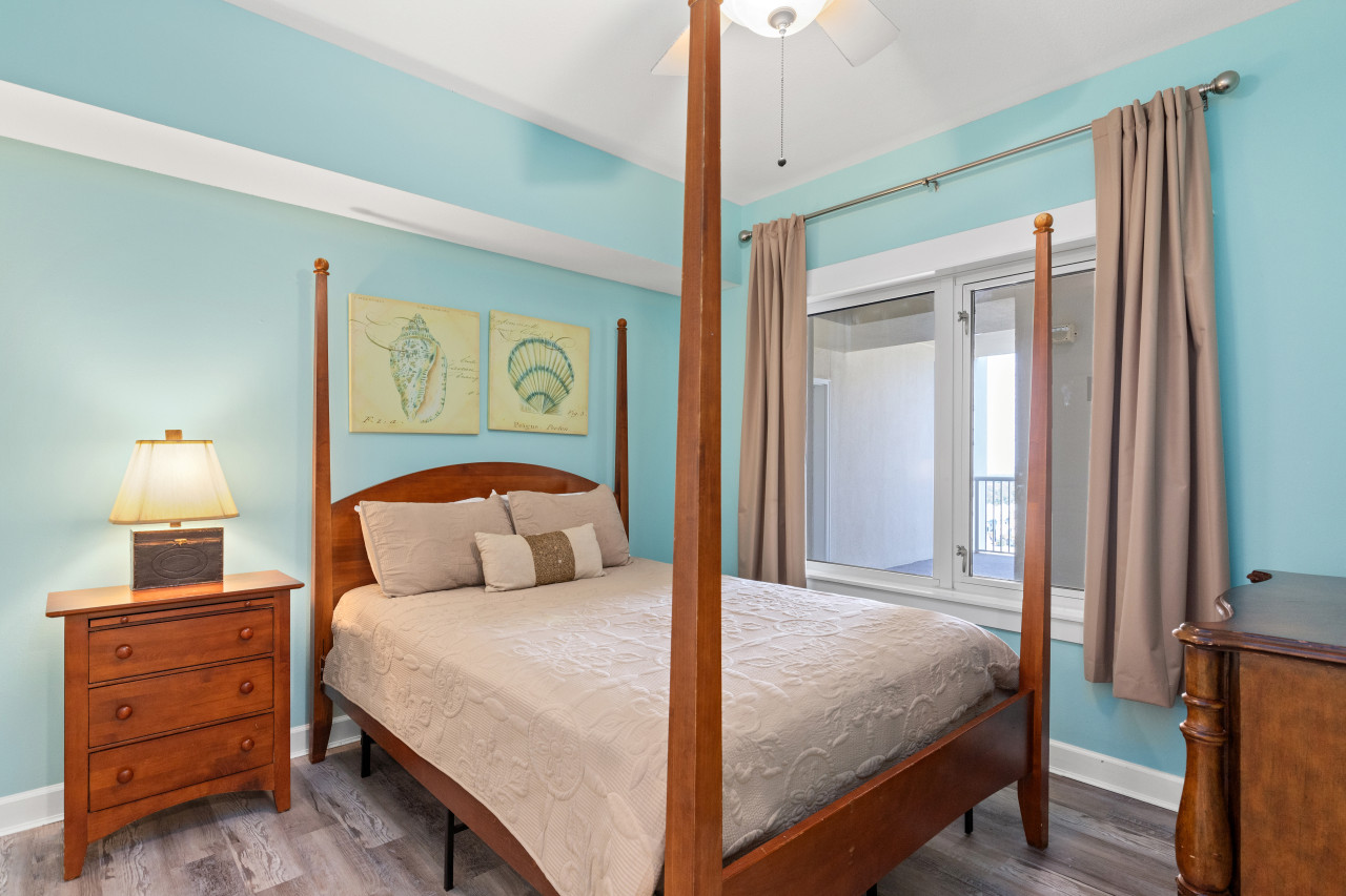 Primary bedroom near the entrance of the condo.