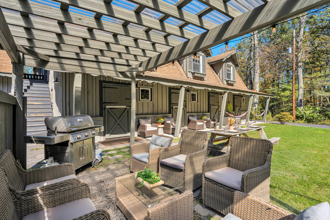 Fire up the grill and enjoy a BBQ feast with plenty of seating for everyone!