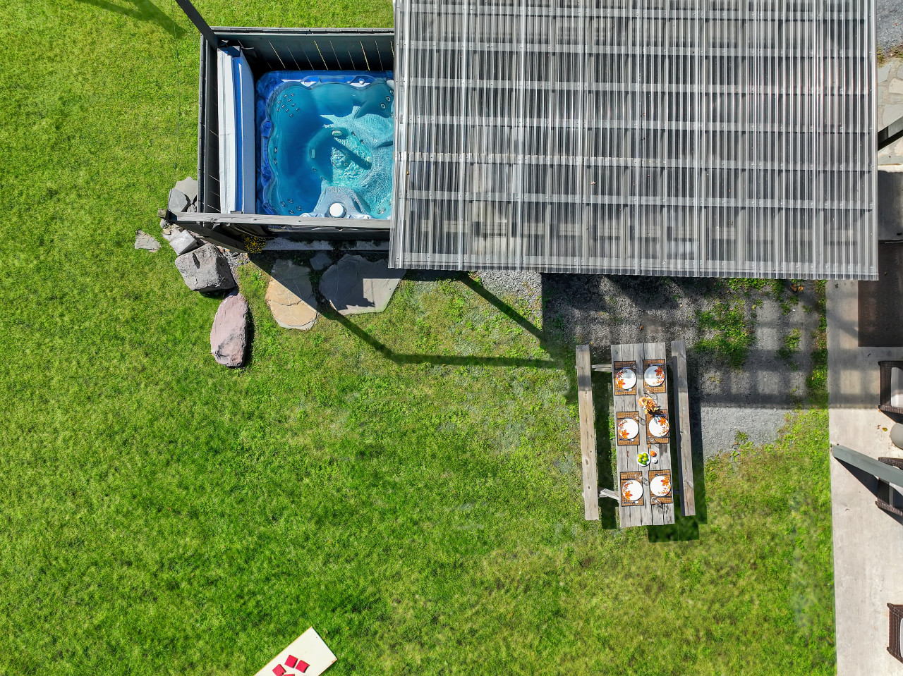 Take in the stunning aerial view of the hot tub — your perfect spot to unwind and soak in the surroundings from above.