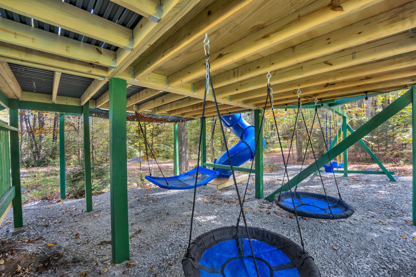 Adventure awaits with the spiral tube slide and a swing for the little ones.