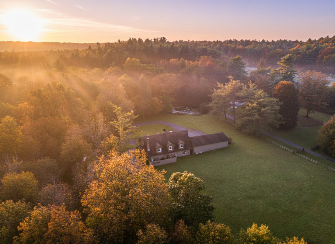 Aerial view at twilight — where the beauty of the property comes to life as the day fades into night. A truly magical escape.