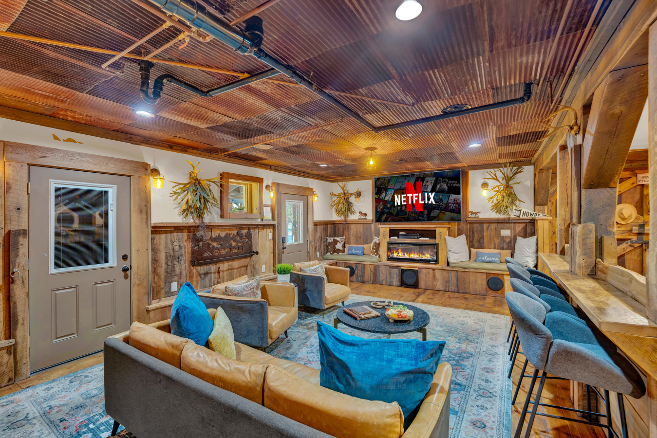 Relax and unwind in the cozy living area of The Stable House — where rustic charm meets modern comfort. Perfect for kicking back after a day of adventure.