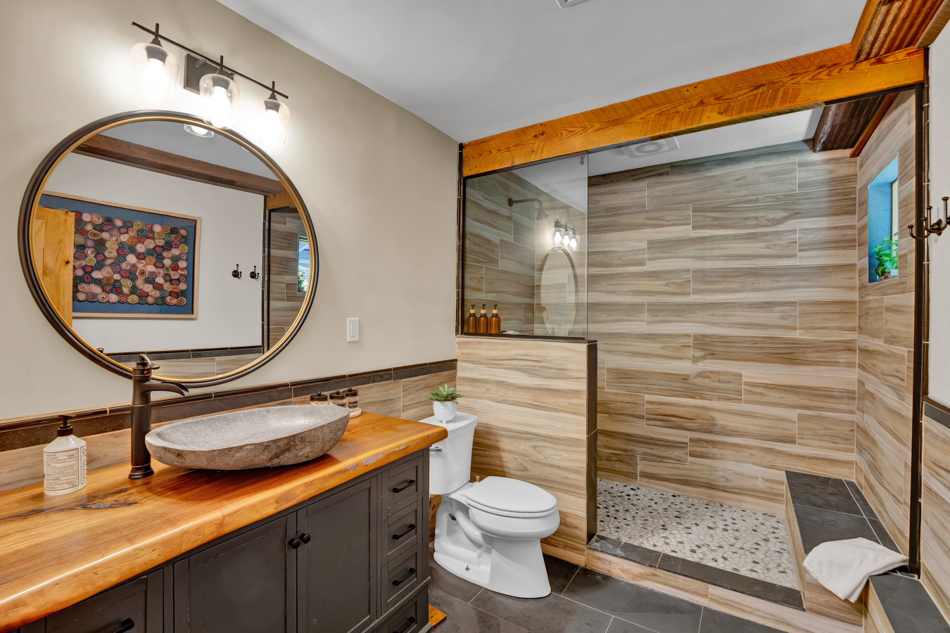 Step into the sleek shower, designed for both relaxation and refreshment.