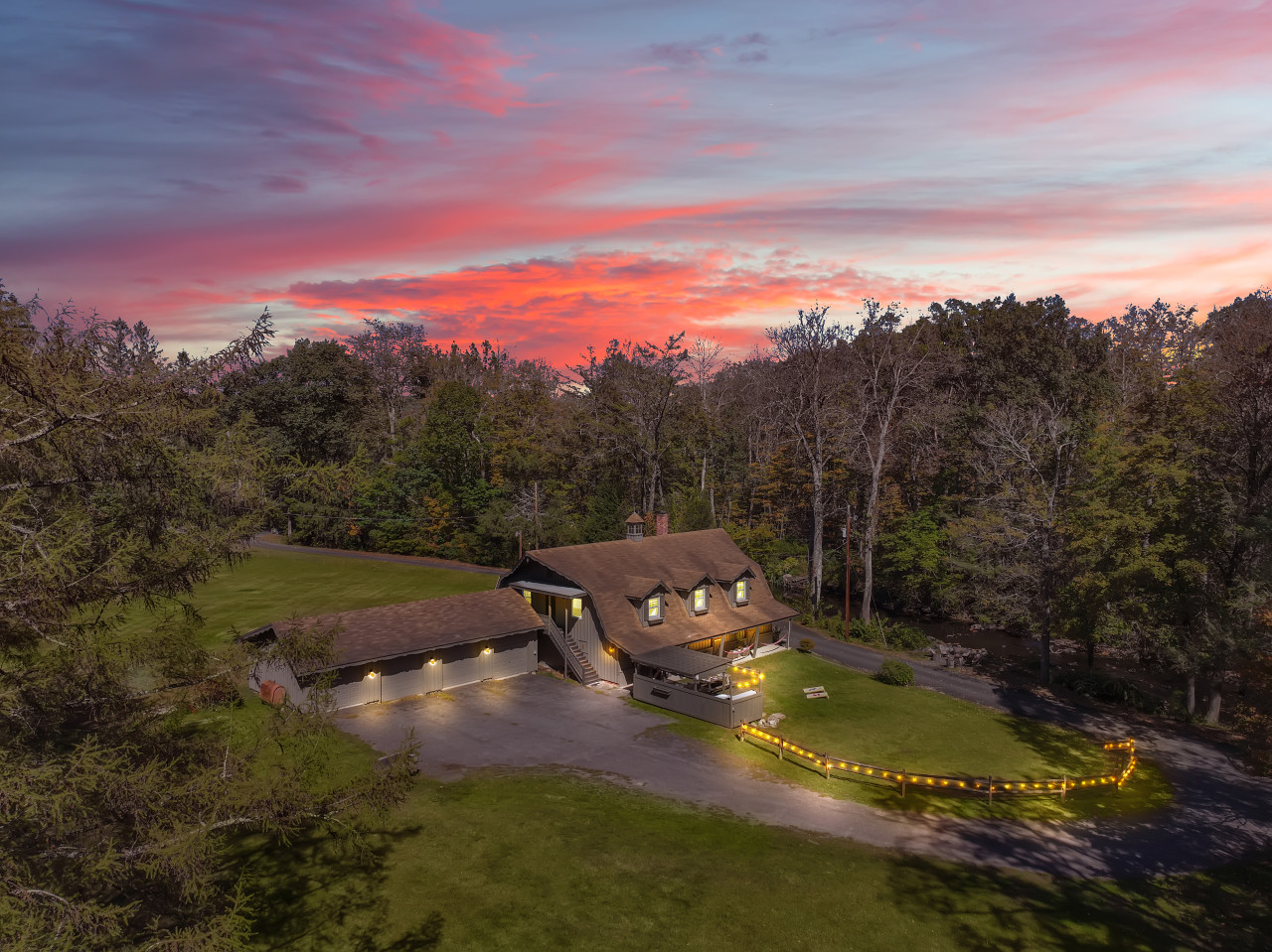 The Stable House at twilight — where peaceful evenings meet breathtaking views.