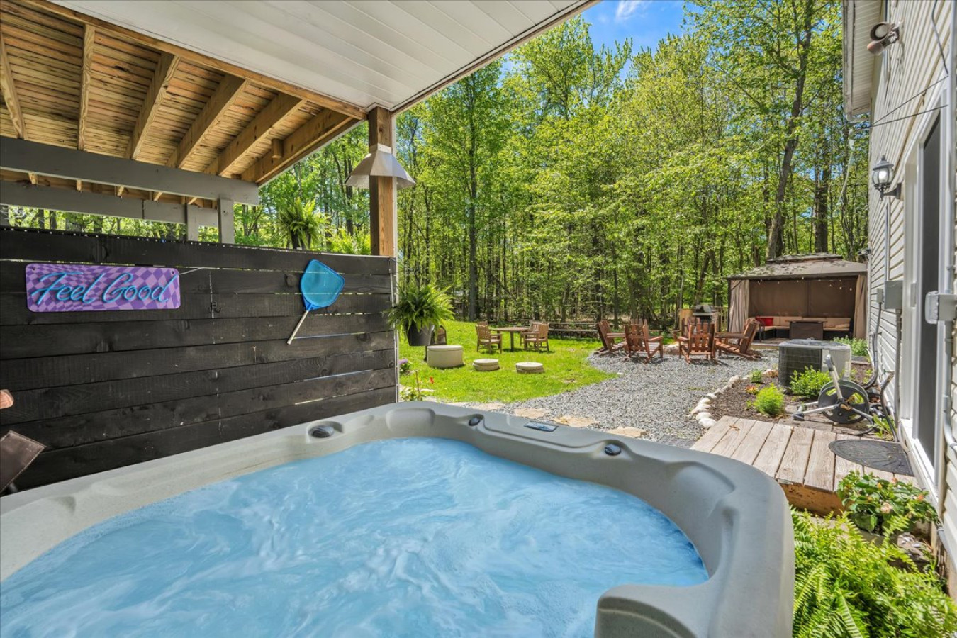 Unwind in your private backyard hot tub – the perfect way to relax after a day of adventure! ✨🛁