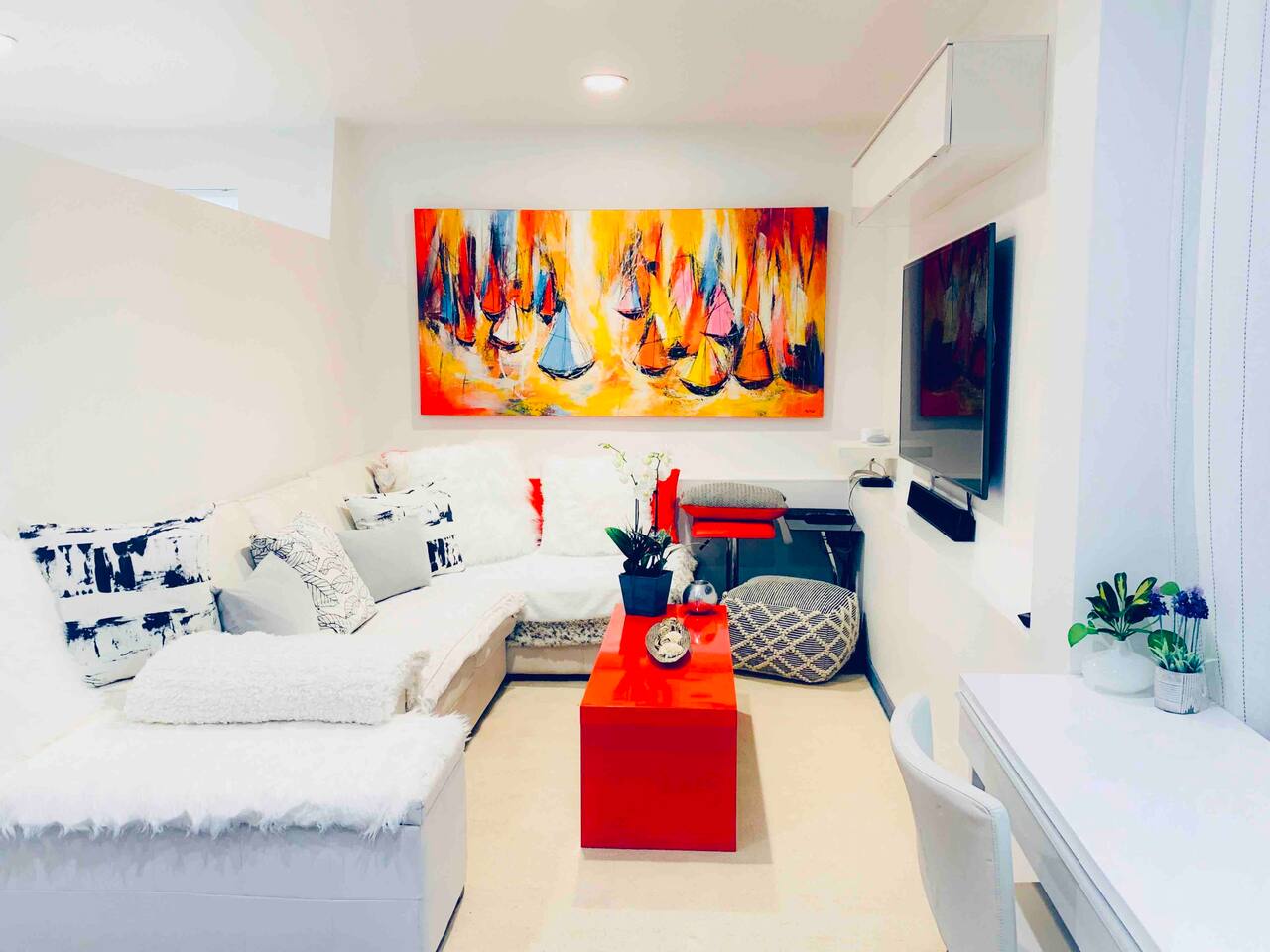 Living room with hydronic- radiant heat polished cement floor