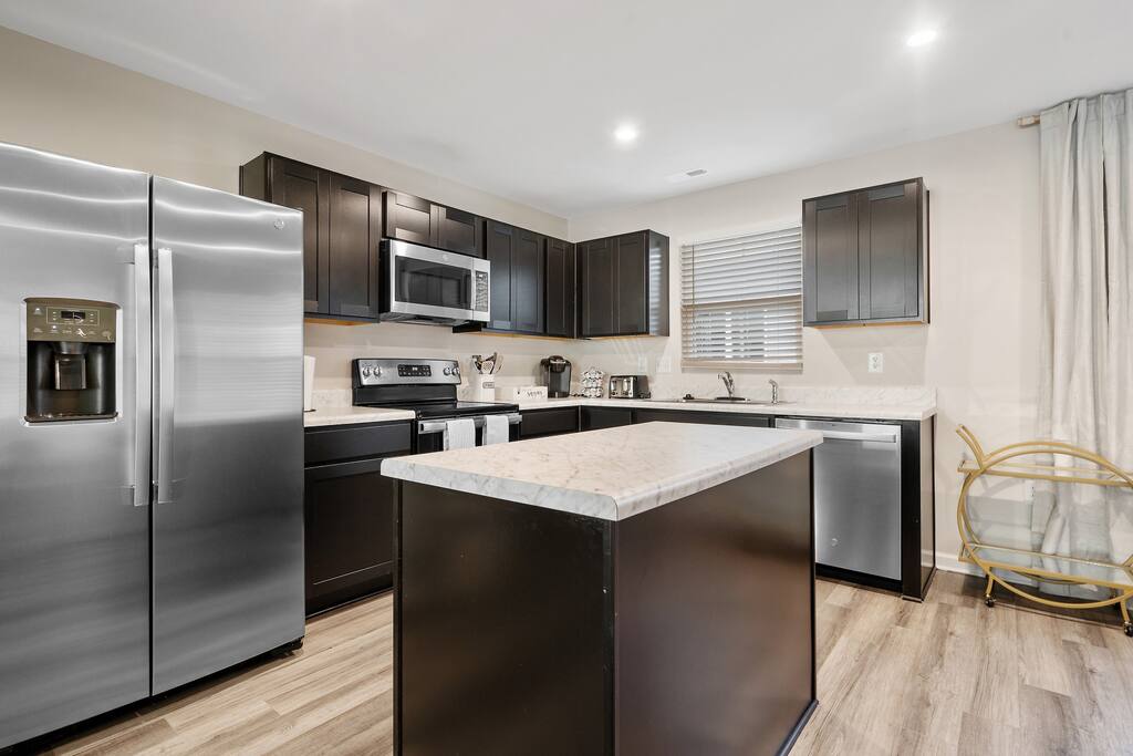 Get ready to craft your favorite dishes in this generously equipped and expansive kitchen space.