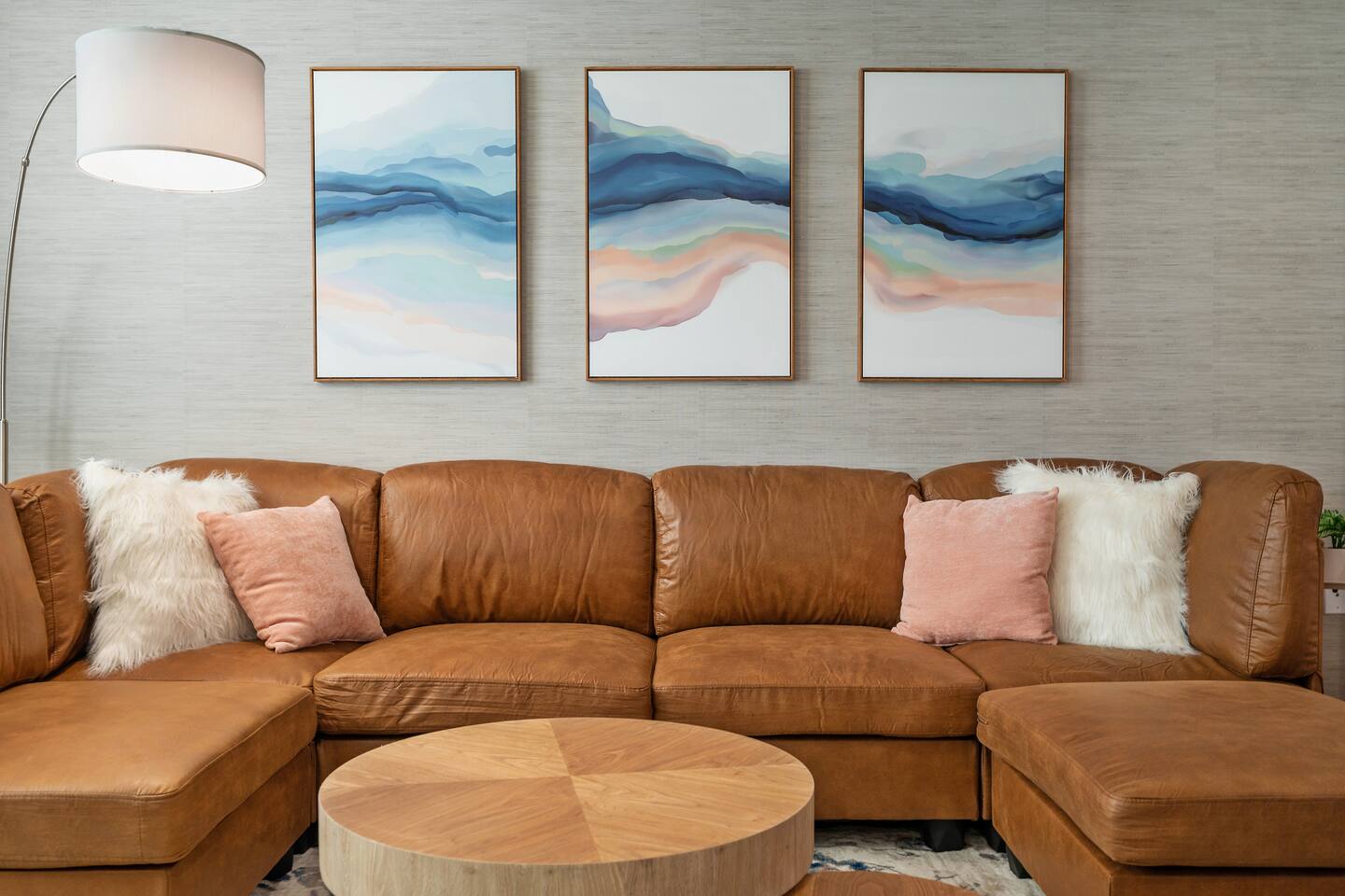 Settle into plush comfort on this inviting sofa, perfect for enjoying your favorite book in absolute coziness.