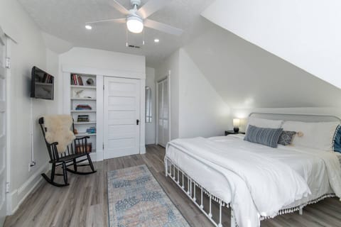 The loft - your private haven, boasting a queen-sized bed tucked away in its own cozy bedroom sanctuary.