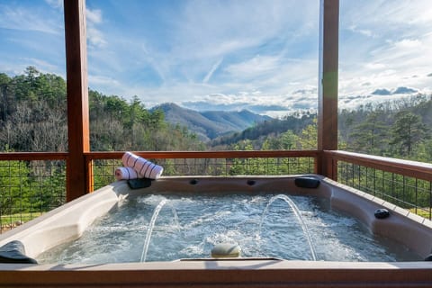 Relax in our hot tub and take in the amazing views of the mountain views.