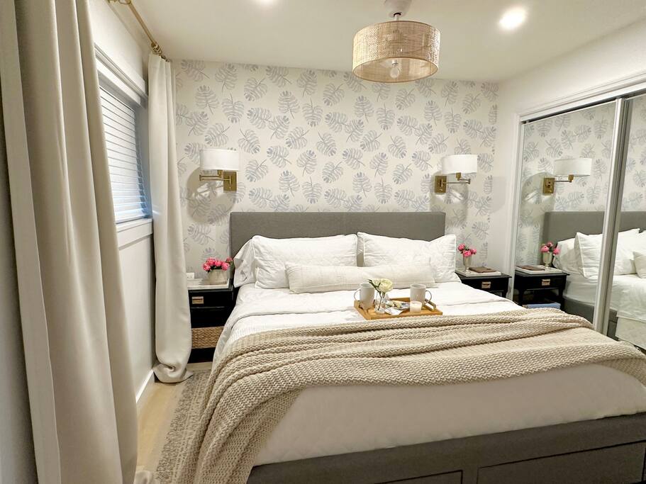 The dreamiest bedroom just got an even better makeover! New wallpaper, a chic fandelier, & cozy bedding bring this space to life. With Luxe, high-quality mattress, double closet, and two dressers, you’ll be sleeping soundly the moment you step in!