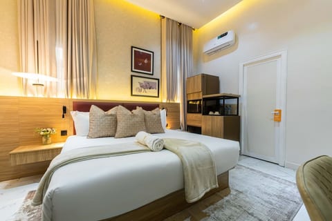 Escape to comfort in our inviting bedroom retreat, a cozy space for unwinding and rejuvenation.