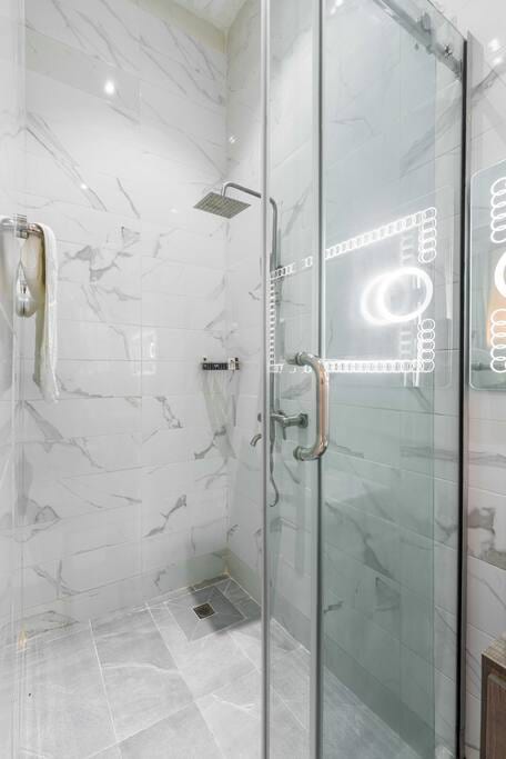 Refresh and rejuvenate in our modern bathroom sanctuary, designed for ultimate relaxation