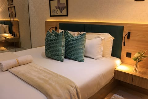 Experience blissful sleep in our serene bedroom retreat, where comfort meets tranquility.