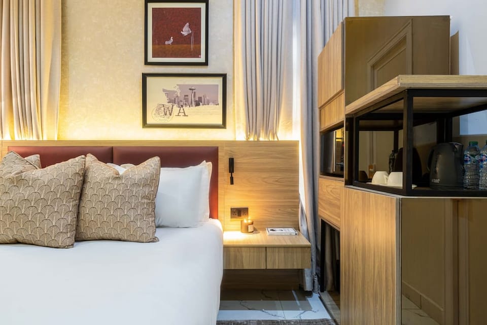 Experience peaceful nights in our beautifully appointed bedroom, designed for ultimate relaxation.