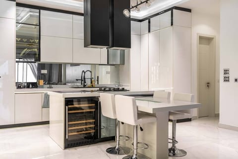 Enjoy meal prep in our well-appointed kitchen, designed for efficiency and style