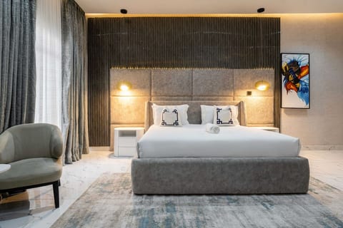 Relax and recharge in this cozy bedroom, designed to make you feel right at home.