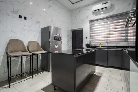 Discover the joy of cooking in our kitchen, complete with state-of-the-art appliances and ample counter space for preparing delicious meals.