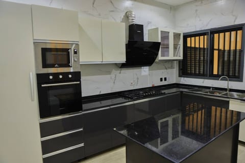 Experience the joy of cooking and dining in this stylish and functional space.
