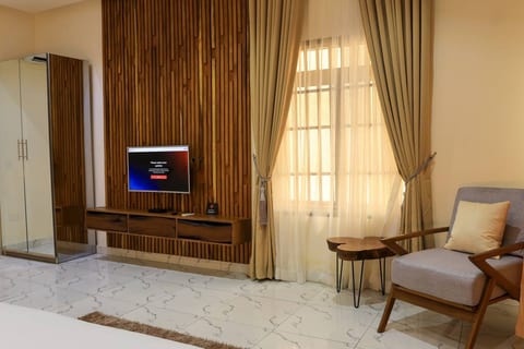 Embrace comfort in our spacious bedroom haven, where every detail is crafted for your relaxation.