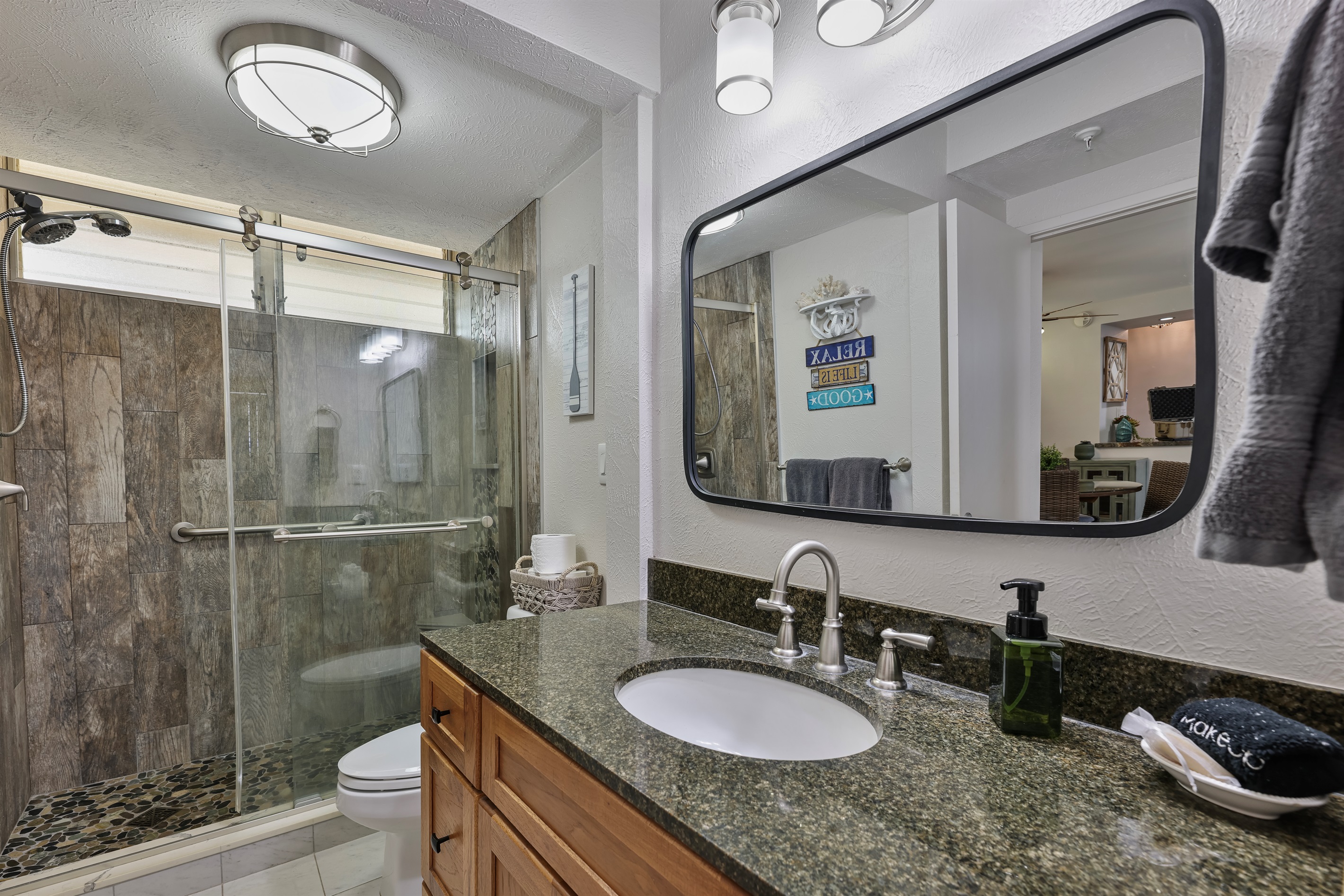 Bathroom with beautiful tiled walk-in shower for spa-like experience!