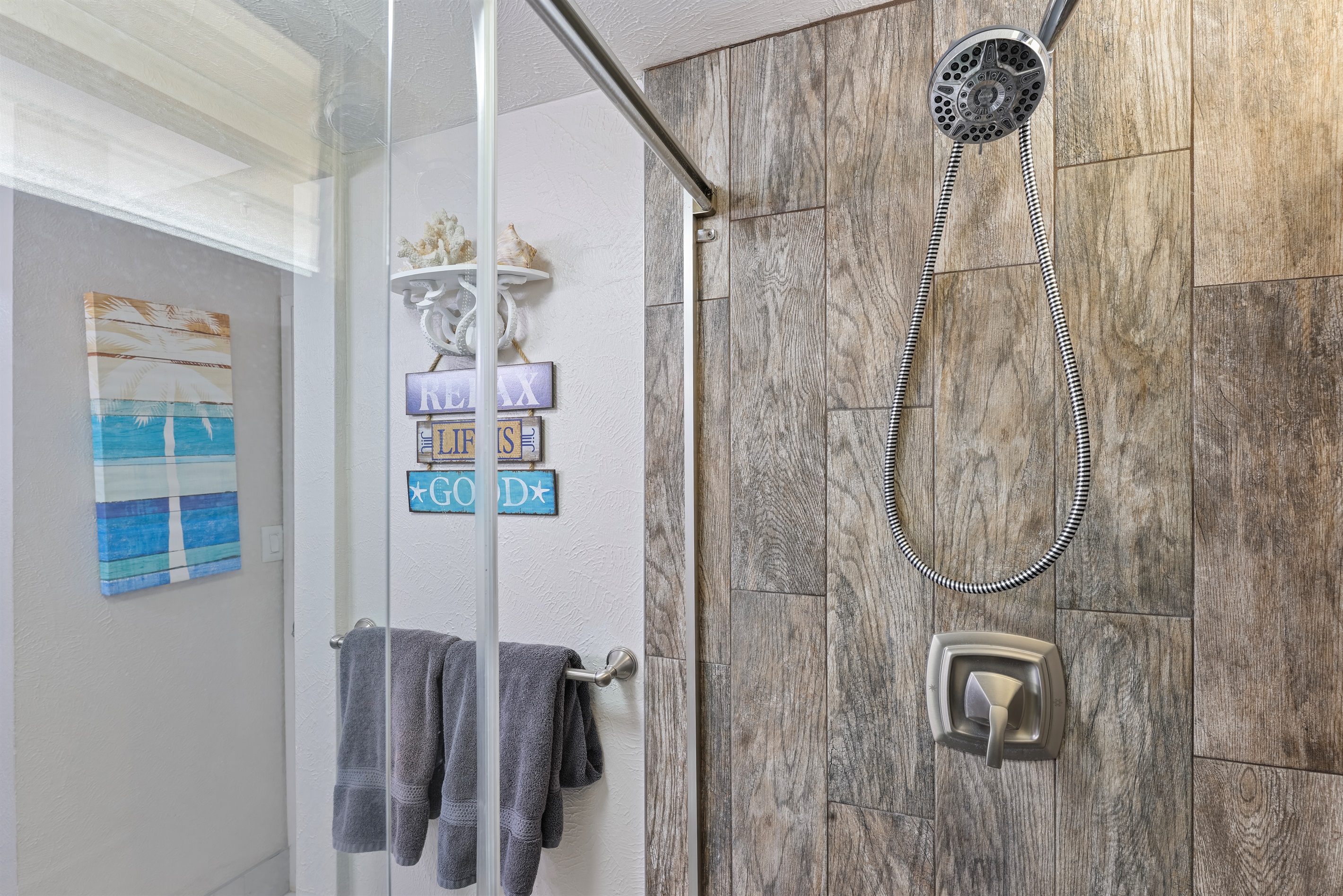 Bathroom with beautiful tiled walk-in shower for spa-like experience!