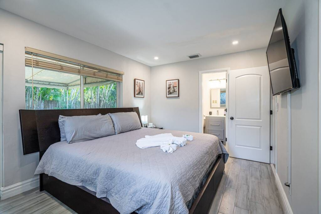 "Warning: This bedroom may lead to an unhealthy obsession with soft blankets, endless cups of tea, and getting lost in a good book." ☕️